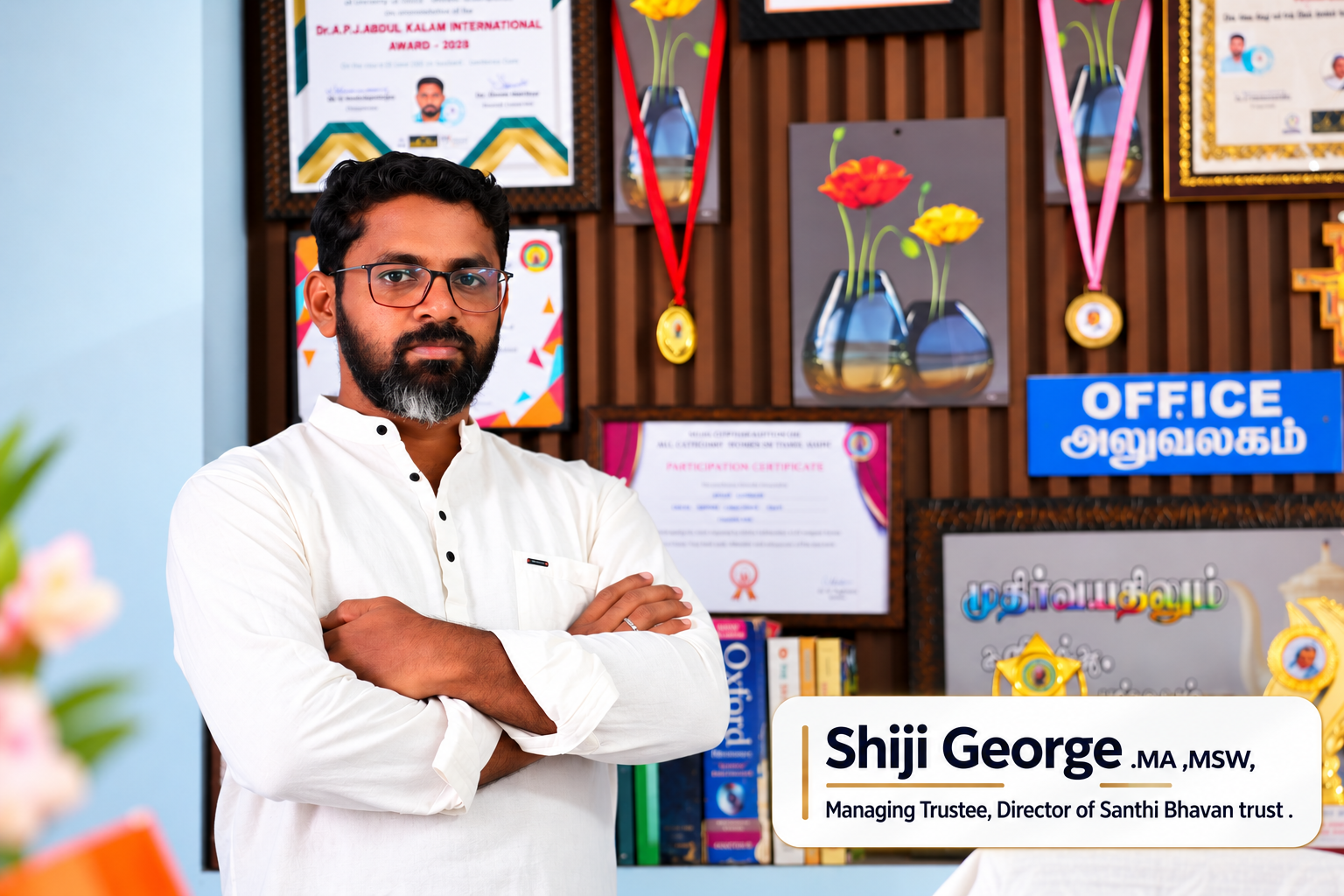 Fr. Shiji George, MA, MSW, Founder & Owner