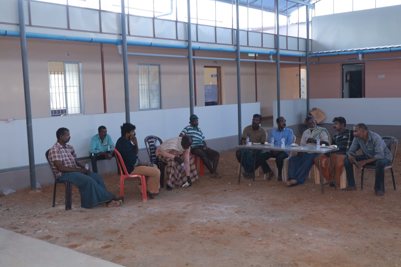 Residents gathered in the sheltered courtyard for evening tea and fellowship